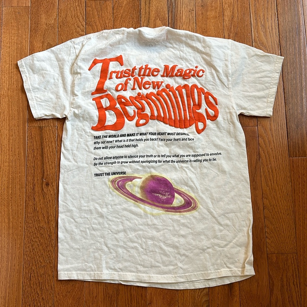 Trust the Universe brand tee shirt